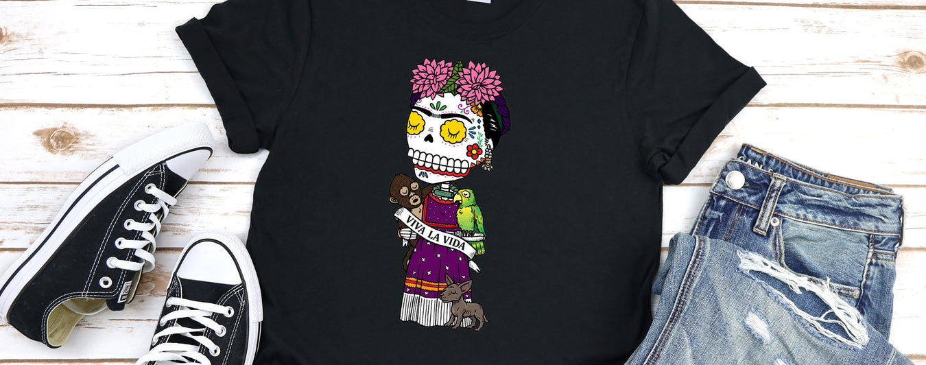 Day of the Dead Frida Kahlo Tee shirt, close up flatlay with blue jeans and black converse