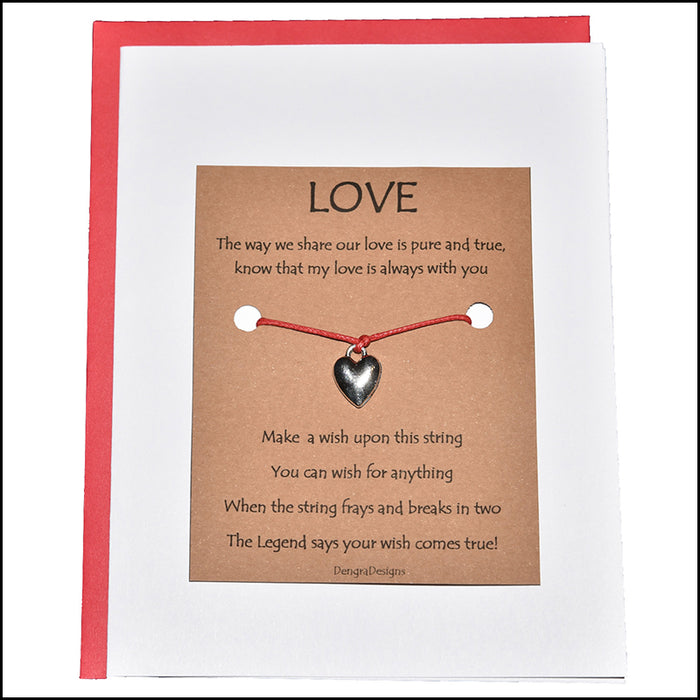 An image of a(n) Love with Heart Charm Charmed Greetingl.