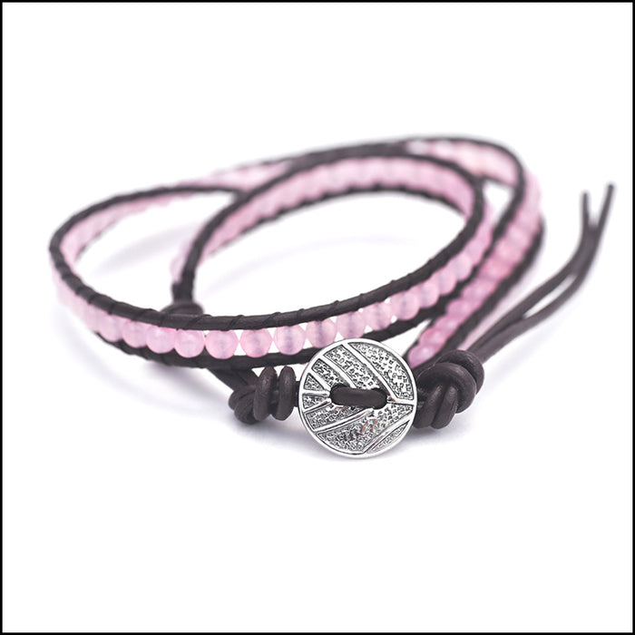 An image of a(n) Rose Quartz - Semi Precious Stones and Leather Wrap Bracelet.
