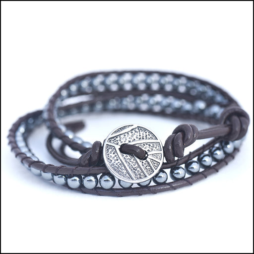 An image of a(n) Hematite - Semi Precious Stones and Leather Wrap Bracelet.